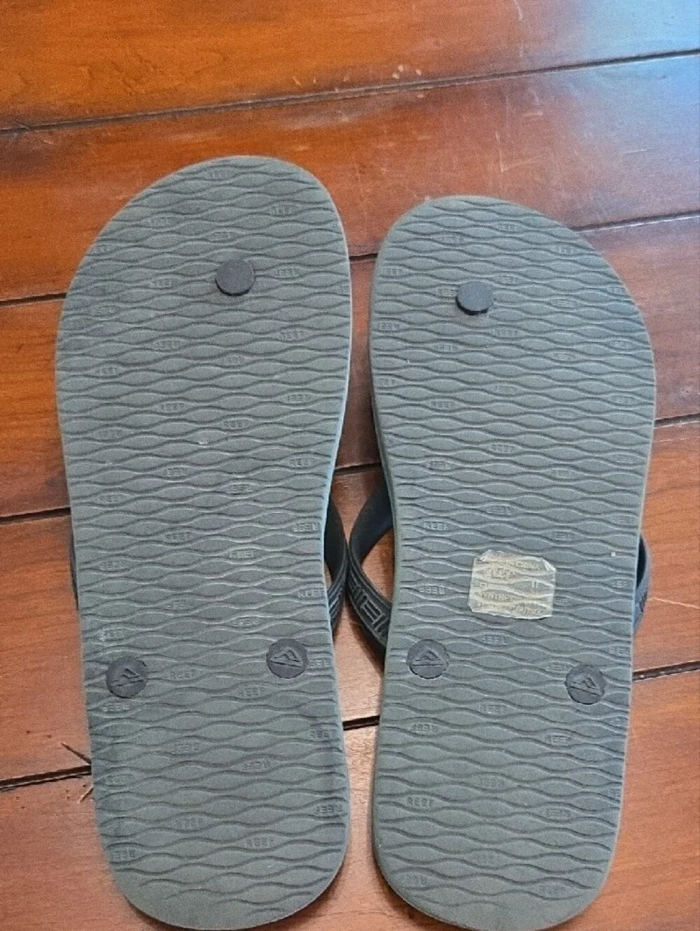 Reef Black Flip Flops with Teal Logo Accents